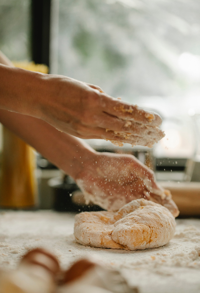 Chef making dough for cookies in bakery